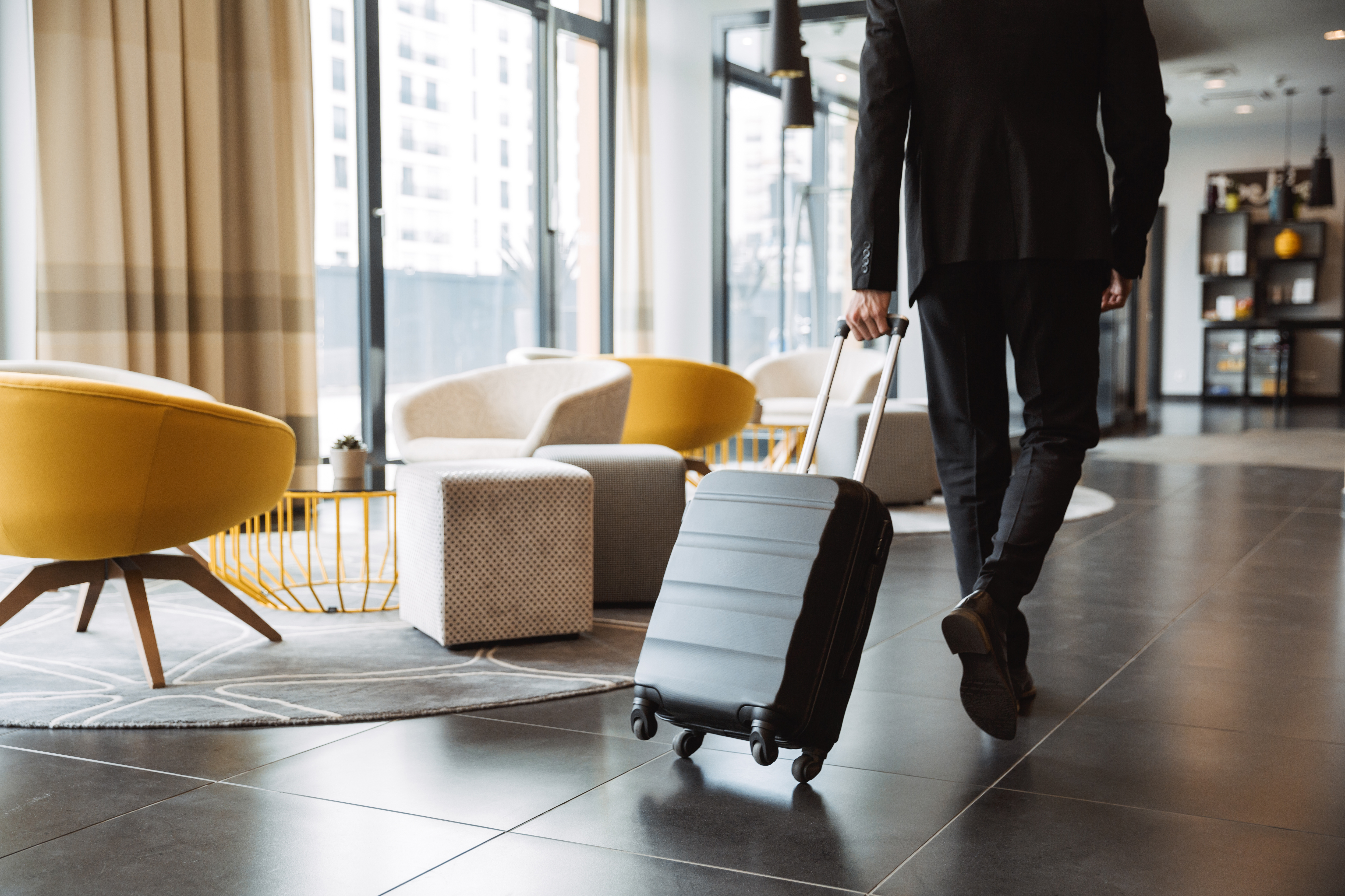 Person travelling with suitcase